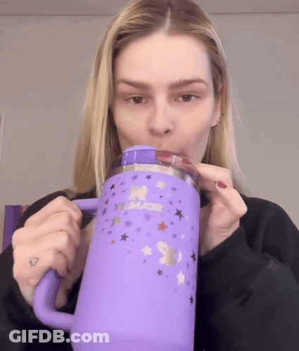 Woman Drinking From Purple Unicorn Tumbler GIF