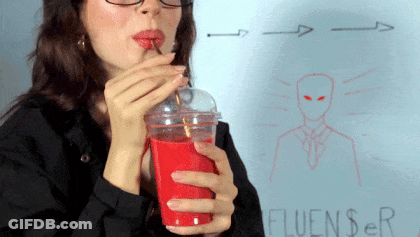 Woman Drinking From Red Cup With Fluencer GIF