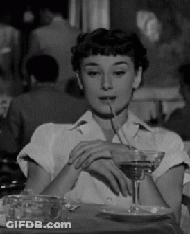 Woman Drinking Martini Through Straw GIF