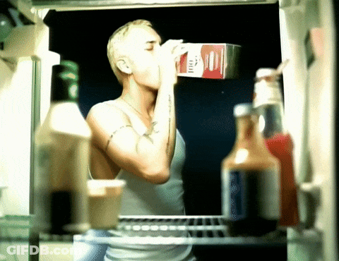 Woman Drinking Milk From Carton GIF