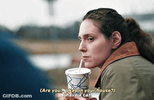 Woman Drinking Milkshake Talking To Man GIF