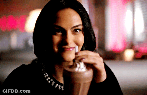 Woman Drinking Milkshake With Whipped Cream Smiling GIF