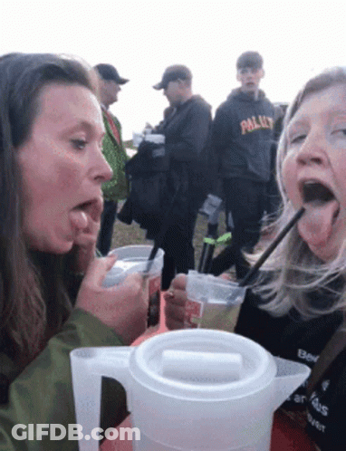 Woman Drinking Pitcher Straw Another Watching GIF