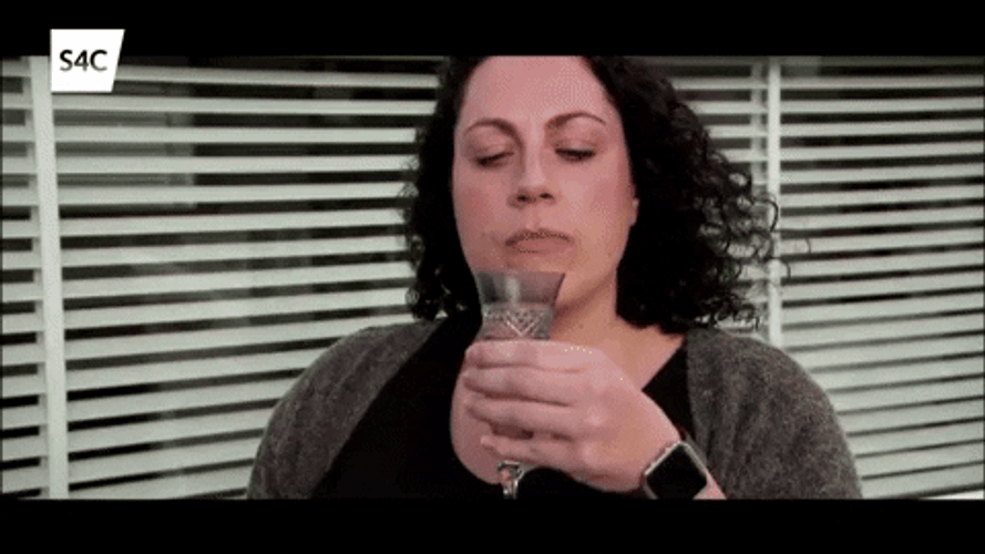 Woman Drinking Prosecco Straight From Bottle GIF