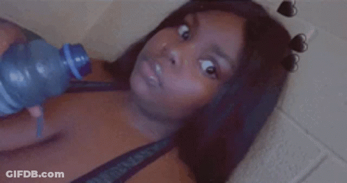 Woman Drinking Water Lying Down GIF