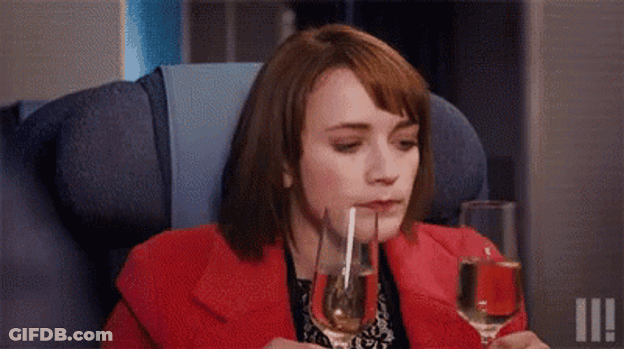 Woman Drinks 2 Glasses Of Prosecco GIF