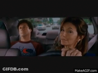 Woman Driving Car Next To Champion Shirt Man GIF