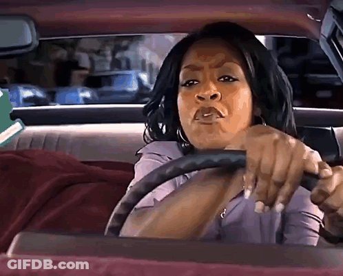 Woman Driving Car With Serious Look GIF