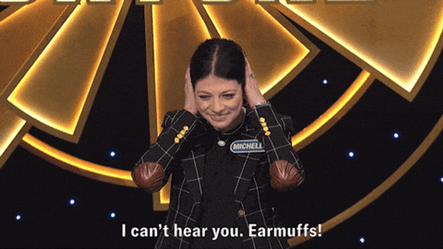 Woman Ear Plugs In Show GIF