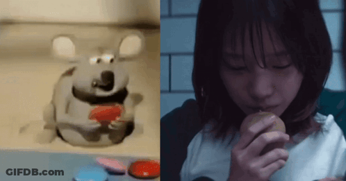 Woman Eating Apple Beside Cartoon Mouse GIF