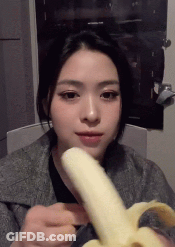 Woman Eating Banana By Avengers Poster GIF