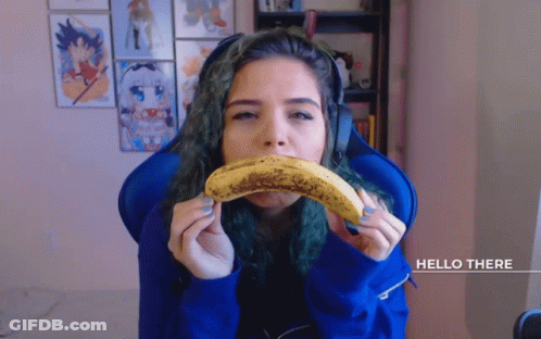 Woman Eating Banana Saying Hello There GIF