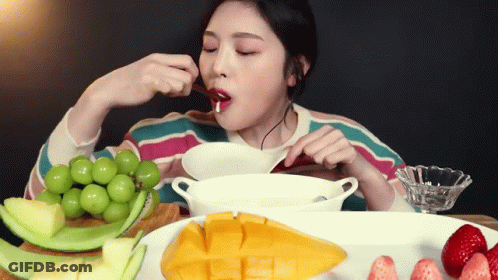 Woman Eating Bowl Of Fruit GIF