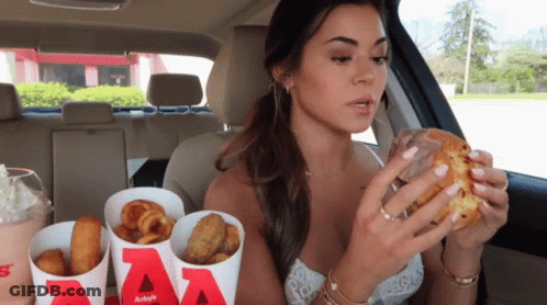Woman Eating Burger King And Fries In Car GIF