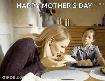 Woman Eating Cake With Child Watching GIF