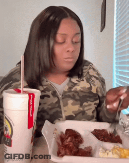 Woman Eating Chicken Wings Drinking Soda GIF
