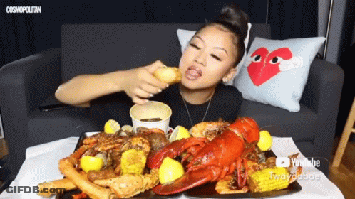 Woman Eating Crawfish Boil On YouTube GIF