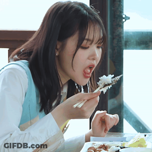Woman Eating Food With Chopsticks Mouth Open GIF