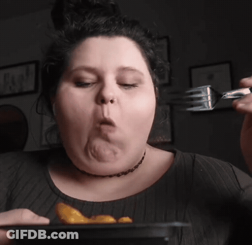 Woman Eating French Fries With Fork GIF