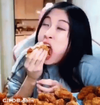 Woman Eating Fried Chicken GIF