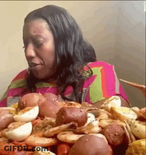 Woman Eating Large Pile Of Food GIF