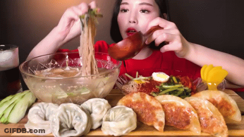 Woman Eating Noodles And Dumplings GIF