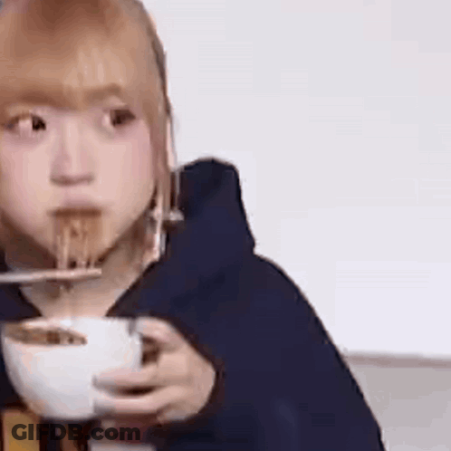 Woman Eating Noodles With Chopsticks GIF