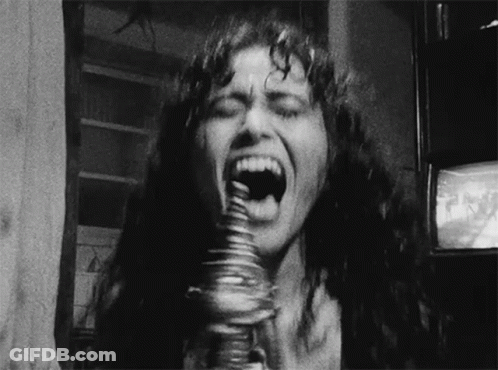 Woman Eating Stack Of Coins GIF