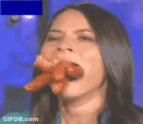 Woman Eating Two Sausages GIF