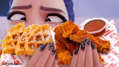 Woman Eating Waffles And Chicken GIF