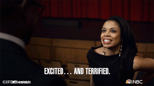 Woman Excited And Terrified Looking At Man GIF