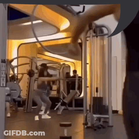 Woman Exercising In Gym GIF