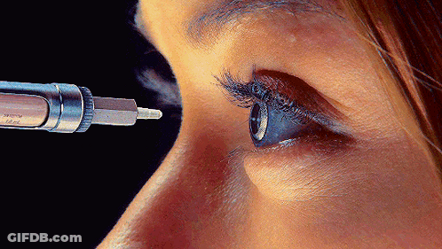 Woman Eye Close Up With Syringe Saying 10Ml GIF