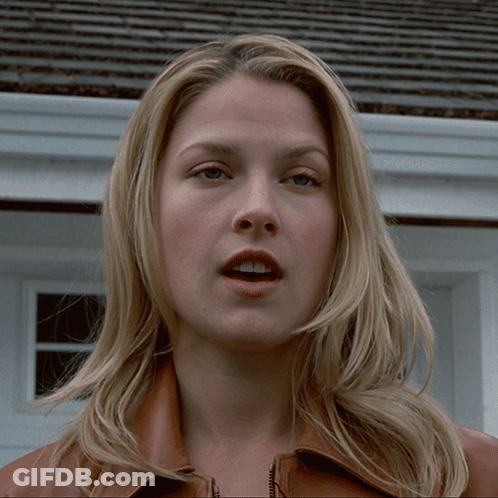 Woman Face Close Up In Front Of House GIF