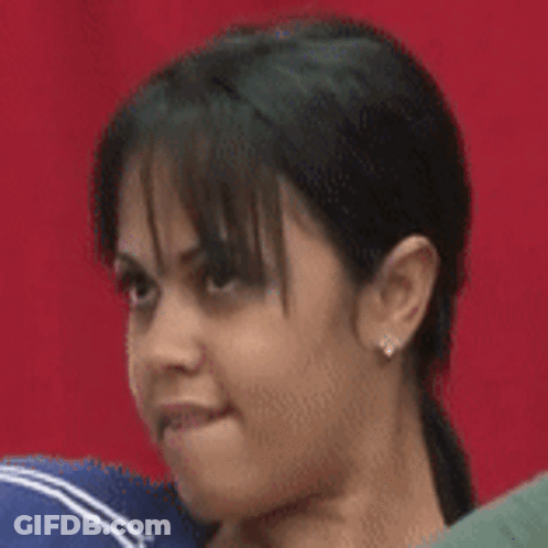 Woman Face Close Up Red Backdrop GIF