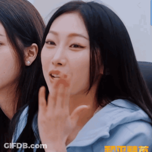 Woman Face Close Up With Chinese Writing GIF