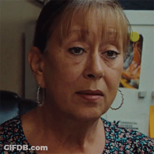 Woman Face Close Up With Hoop Earrings GIF