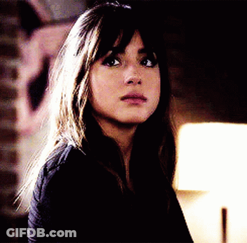 Woman Face Close Up With Lamp GIF