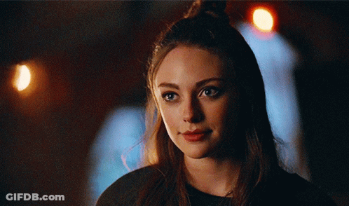 Woman Face Close Up With Lights GIF