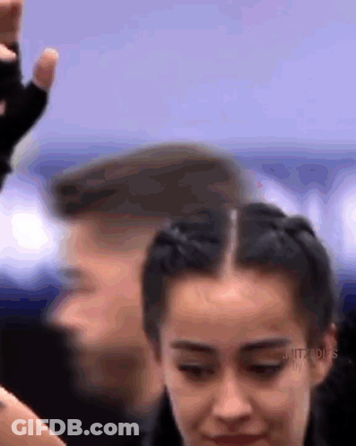 Woman Face Close Up With Man Hand GIF