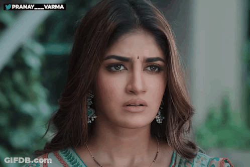 Woman Face Close Up With Pranay Varma Text GIF