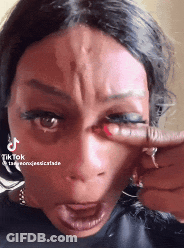 Woman Face Close Up With TikTok GIF