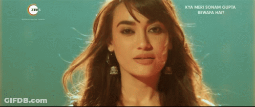 Woman Face Close-Up With Zee Logo GIF