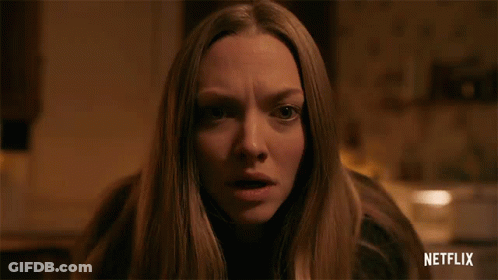 Woman Face In Dark Room With Netflix Logo GIF