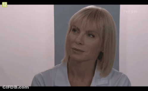 Woman Face On TV Screen With Number 12 GIF