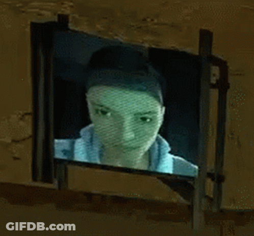 Woman Face Projected On Screen GIF