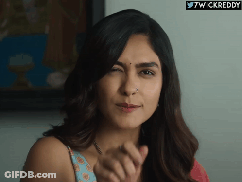 Woman Face With 7Wickreddy GIF