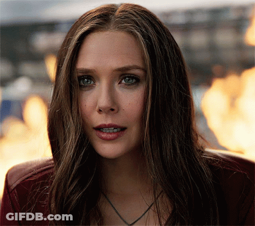 Woman Face With Fire Behind Her GIF