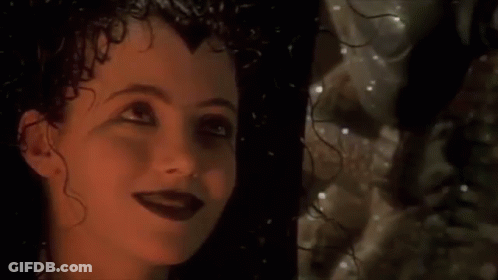 Woman Face With Person Reflection In Background GIF