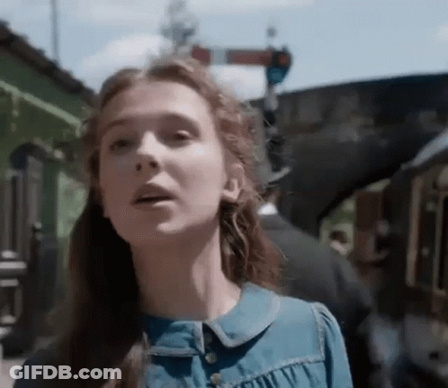 Woman Face With Train In Background GIF